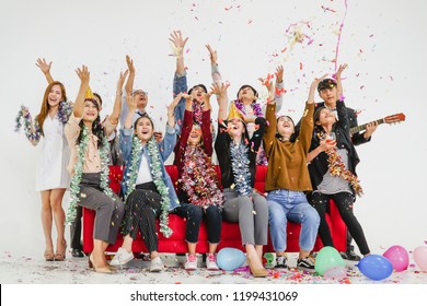 Asian People Cheering And Celebrating On White Background, Party And Celebration Concept.