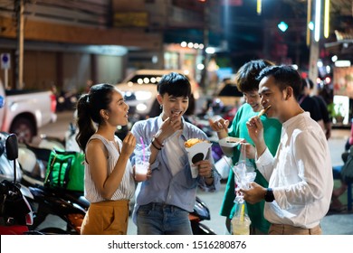 Asian people are eating Thailand street food dinner. Street dining. - Powered by Shutterstock