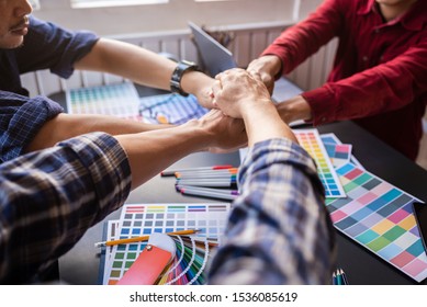 teacher and librarian joining hands