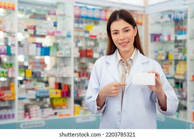 Asian Pharmacist Woman With Protection Mask In Pharmacy Store Of Her Business For Sale A Drug And Pharmacy With Her Customer