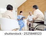 Asian physical therapy vs. nursing or doctor talking to group of old elderly patient and relax to get good health in rehabilitation clinic, Senior lifestyle activity recreation concept.