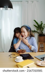 Asian Portrait, Grandmother And Granddaughter Doing Leisure With Little Children Whispering Secrets Between Each Other