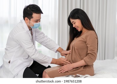 Asian Pregnant Woman Visit Gynecologist Doctor At Hospital For Pregnancy Consultant