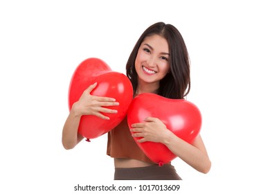 Asian pretty girl and a red heart on whitr islated background, this immage can use for valentine, valentines day, love, holiday and lady beauty concept