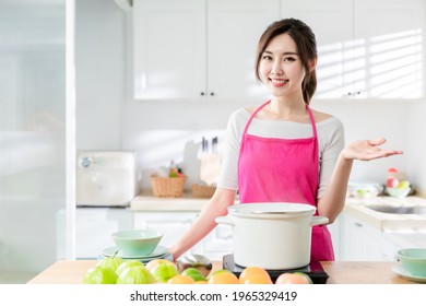 Asian pretty housewife introduce about cooking healthy meal at home