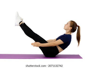 Asian Pretty Sporty Woman In Black Sportwear Pigtail Hair Leg And Arm Stretching On The Purple Yoga Mat On The White Background.