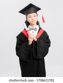 Asian Primary School Girls Who Are Painting

