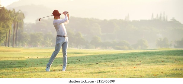 Asian  Professional Golfer With Golfe Club Playing  Golfe At Golf , Course , Sport Healthy Concept 