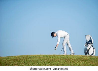 Asian  Professional Golfer With Golfe Club Playing  Golfe At Golf , Course , Sport Healthy Concept 