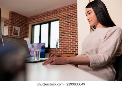 Asian Programmer Coding Software App With Html Script, Using Firewall Server Encryption For Web App Development. Female Coder Programming New User Interface On Multiple Monitors.