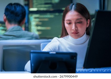 Asian programmer leverages generative AI assistance for deep learning and data driven analysis, optimizing a scalable, cloud native workflow in their modern, hyper automated smart office