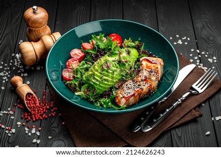Asian salad with turkey and avocado with teriyaki sauce