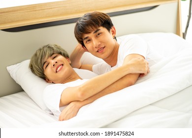 Asian Same Sex LGBTQ Couple Lovers Lying On The Bed Together