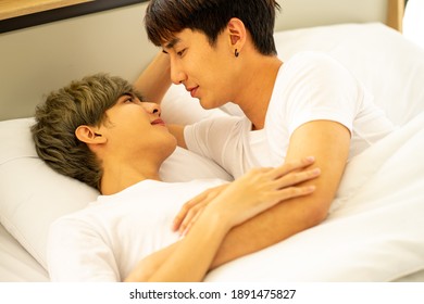 Asian Same Sex LGBTQ Couple Lovers Lying On The Bed Together