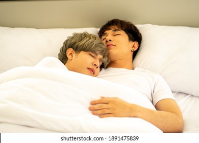 Asian Same Sex LGBTQ Couple Lovers Lying On The Bed Together