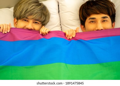 Asian Same Sex LGBTQ Couple Lovers Lying On The Bed Together