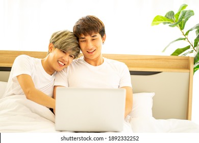 Asian Same Sex LGBTQ Couple Lovers Lying On The Bed Together