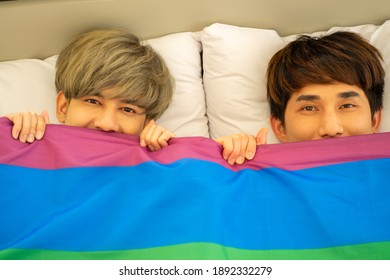 Asian Same Sex LGBTQ Couple Lovers Lying On The Bed Together