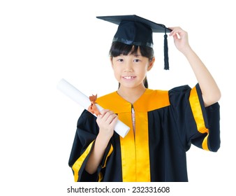 Asian School Kid In Graduation Gown 