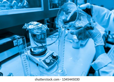 Asian scientist working in the lab,Experiment for customer,Using the formula, the physics and chemistry to calculate the value of the experiment,Thailand people