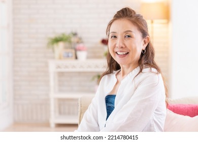 Asian senior age woman relaxing