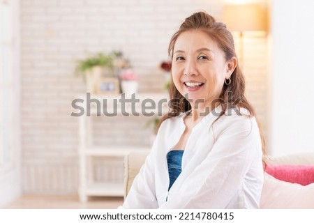 Asian senior age woman relaxing