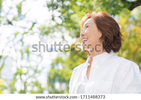 Asian senior age woman , smile
