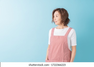 Asian senior age woman who cooks