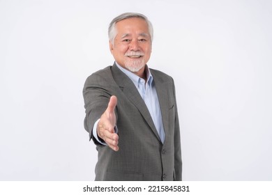 Asian Senior Businessman , Senior Man , Old Man Offering Handshake Get Acquainted Or Greeting At Meeting Isolated On White Background , Business Concept