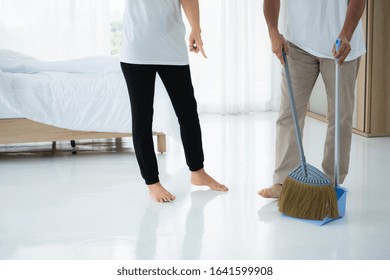 Asian Senior Couple Cleaning Bedroom Floor. Retirement And Healthy Elderly Concept.