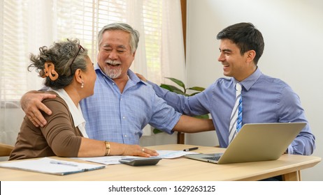 Asian Senior Couple Feeling Happy And Pleasant After Received Advice About Family Financial Planning From Professional Financial Planner Staff At Home.