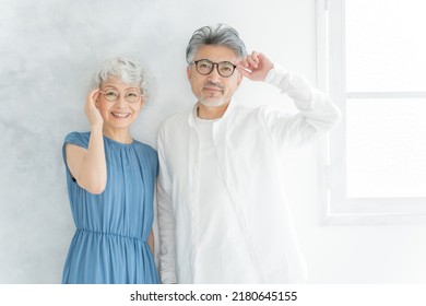 Asian Senior Couple With Glasses