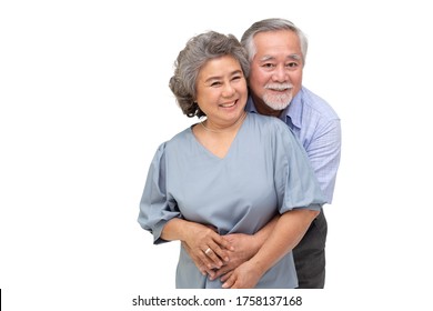 Asian Senior Couple Hugging Together Isolated Over White Background