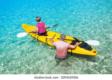 Asian Senior Couple On Kayak In Adventure Travel In South East Asia.