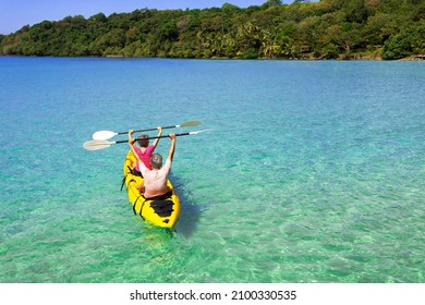 Asian Senior Couple On Kayak In Adventure Travel In South East Asia.