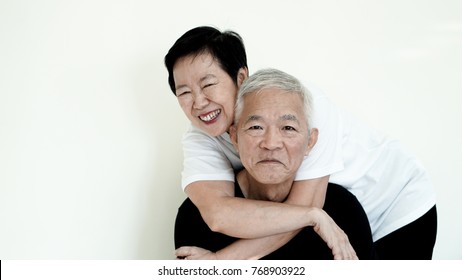 Asian Senior Couple Smile Together Life With No Worry On White Background