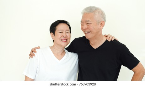 Asian Senior Couple Smile Together Life With No Worry On White Background