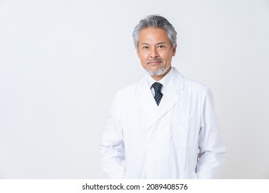 Asian senior doctor in a white coat