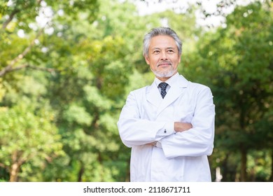 Asian senior doctor in a white coat