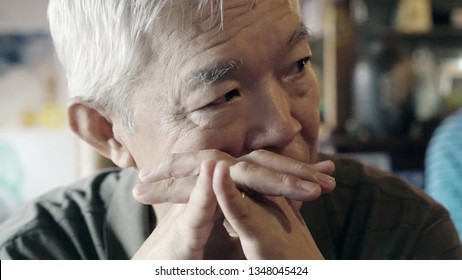 Asian senior elder man thinking about life vintage color - Powered by Shutterstock