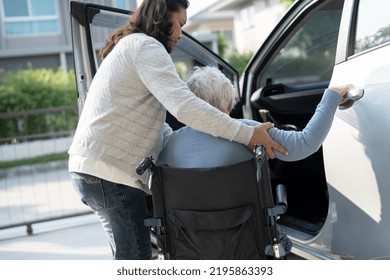 Asian Senior Or Elderly Old Lady Woman Patient Sitting On Wheelchair Prepare Get To Her Car, Healthy Strong Medical Concept.