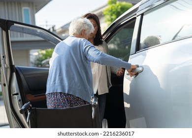 Asian Senior Or Elderly Old Lady Woman Patient Sitting On Wheelchair Prepare Get To Her Car, Healthy Strong Medical Concept.