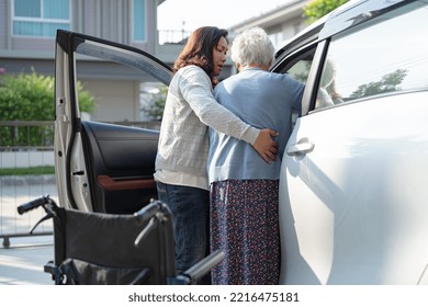 Asian Senior Or Elderly Old Lady Woman Patient Sitting On Wheelchair Prepare Get To Her Car, Healthy Strong Medical Concept.