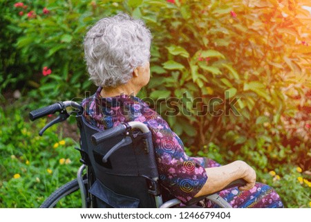 Similar – Senior woman in a wheelchair with her daughter