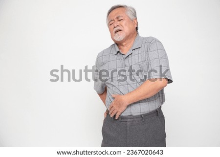 Asian senior man with back pain isolated on white background, Spinal degeneration or Dislocated back bone herniated spinal disc concept