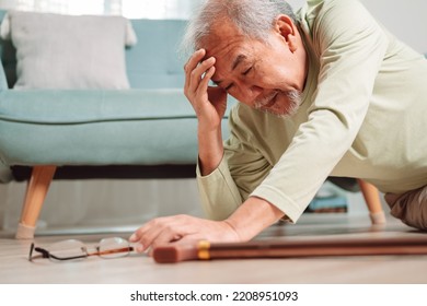 Asian Senior Man Falling On The Ground With Walker In Living Room At Home. Elderly Older Mature Male Having An Accident Headache For Emergency Help Support From Hospital. Insurance Health Care.