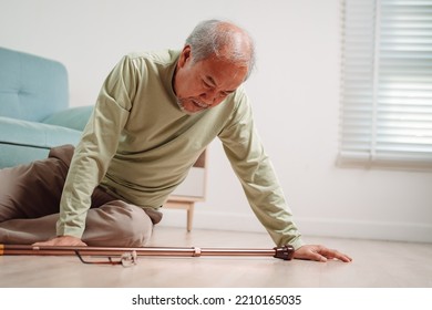 Asian Senior Man Falling On The Ground With Walker In Living Room At Home. Elderly Older Mature Male Having An Accident Heart Attack For Emergency Help Support From Hospital. Insurance Health Care.