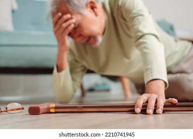 Asian Senior Man Falling On The Ground With Walker In Living Room At Home. Elderly Older Mature Male Having An Accident Headache For Emergency Help Support From Hospital. Insurance Health Care.