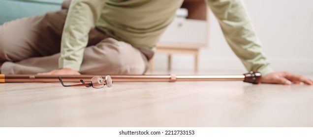 Asian Senior Man Falling On The Ground With Walker In Living Room At Home. Elderly Older Mature Male Having An Accident Heart Attack For Emergency Help Support From Hospital. Insurance Health Care.