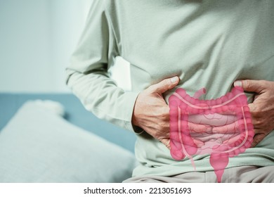 Asian Senior Man Feel Stomach Ache. Older Mature Male Touch Belly With Intestine, Probiotics Food For Gut Health, Colon Cancer, Stay At Home. Bowel Problem Health Care And Medical Insurance Concept.